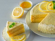 Рецепта Лека лимонова торта с лимонов бял крем и кокосови стърготини